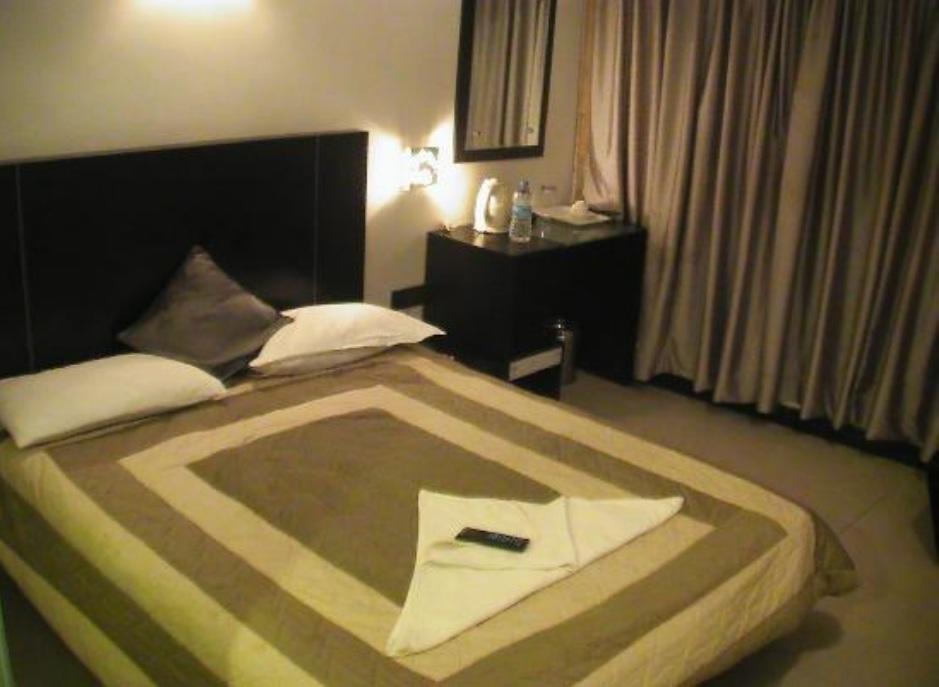 Hotel T.A.P. Gold Crest Bangalore Værelse billede